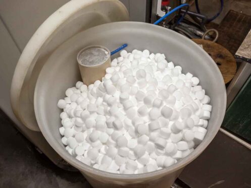 A barrel of salt blocks for the water softener